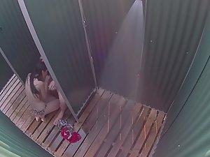 Spying on blowjob in beach showers Picture 6