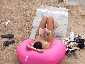 Big topless boobs of beach girl reading a book Picture 5