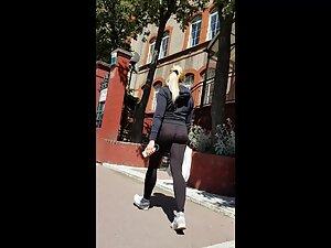 Thong and buttocks of fit milf in black leggings Picture 8