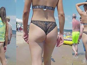Sexy girl in wet lace panties on beach Picture 3