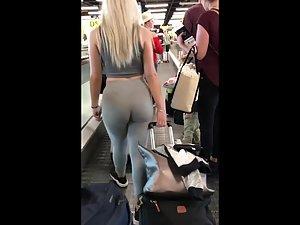 Following blonde's big booty while she pulls luggage Picture 8