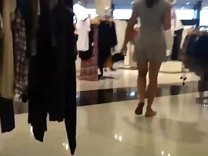 Cutie holds the dress out in the wind Picture 2