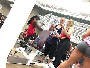 Hot teens flirting with bodybuilder in gym Picture 7