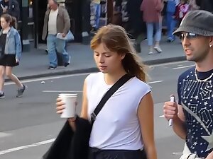 Hipster girl isn't wearing a bra in public