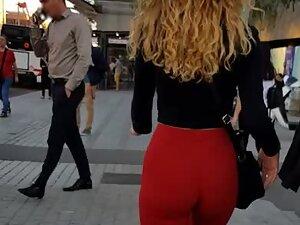 Daydreaming while watching her wiggly ass in red pants