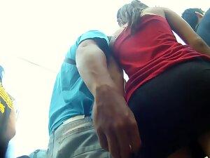 Upskirt of hairy girl while she is with protective boyfriend Picture 6