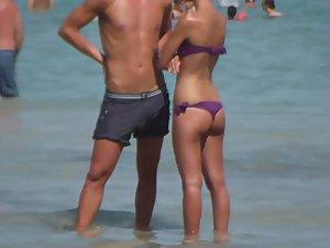 Tattooed hottie in a thong bikini Picture 1