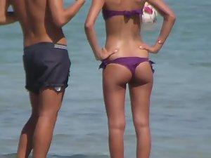 Tattooed hottie in a thong bikini Picture 5