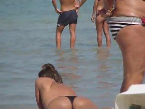 Tattooed hottie in a thong bikini Picture 6