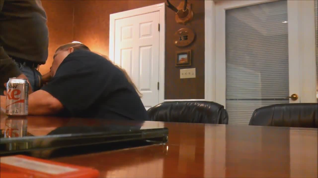 Fat employee gives blowjob to boss in office picture