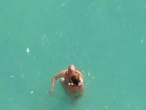 Horny couple in the water got caught Picture 3