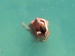 Horny couple in the water got caught Picture 6