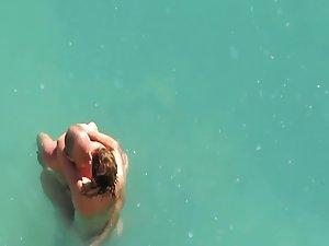 Horny couple in the water got caught Picture 8
