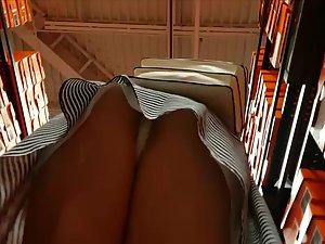 Upskirt when she moons the voyeur in shoe store Picture 3