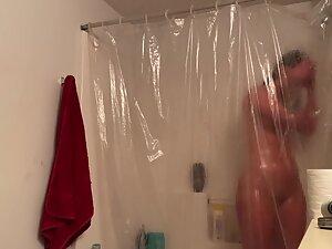 Spying on naked badass girl in her shower Picture 5
