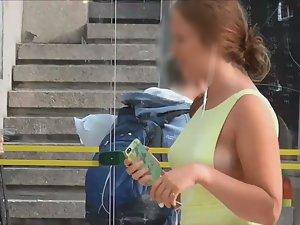 Sideboob of teen girl without a bra