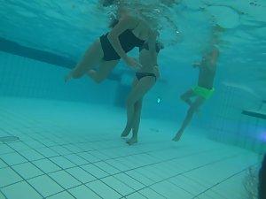 Big young boobs shaking while she swims Picture 1
