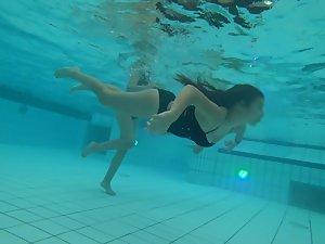 Big young boobs shaking while she swims Picture 2