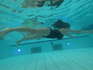 Big young boobs shaking while she swims Picture 3