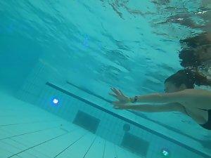 Big young boobs shaking while she swims Picture 5