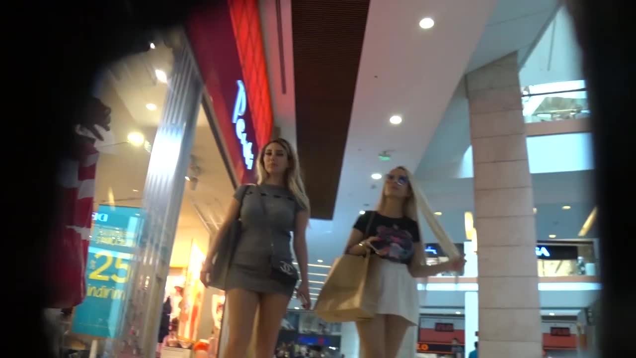 Voyeur porno vid of a couple of sexy bitches shopping upskirt