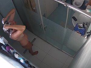Fuckable busty milf caught by hidden cam in shower Picture 2