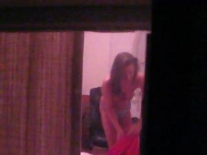 Quick glimpse of a topless neighbor girl Picture 2