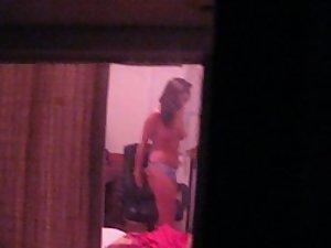 Quick glimpse of a topless neighbor girl