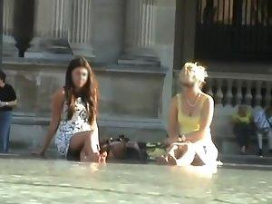 Upskirt of a girl by the fountain Picture 4
