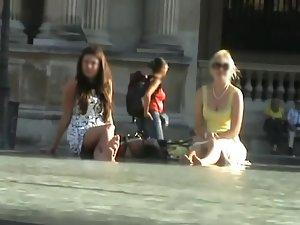 Upskirt of a girl by the fountain Picture 5