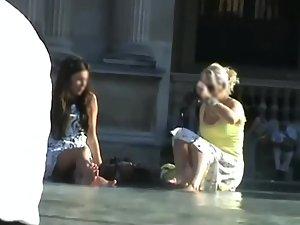 Upskirt of a girl by the fountain Picture 6