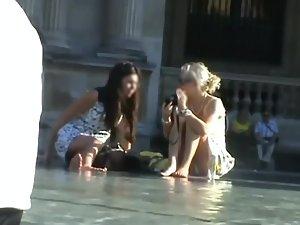 Upskirt of a girl by the fountain Picture 8