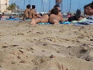 Peeping directly at young bubble butt on beach Picture 1