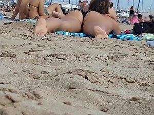Peeping directly at young bubble butt on beach Picture 2