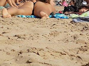 Peeping directly at young bubble butt on beach Picture 5