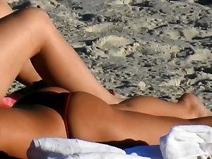 Hot blonde sunbathing next to butch lesbian friend Picture 6