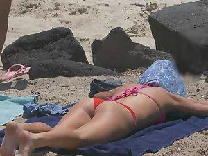 Hot teen in red thong bikini on beach with family Picture 4