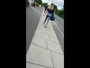 Following a fit girl with a sport bag Picture 1