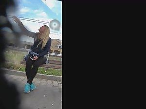Curvy girl in torn jeans is smoking and waiting for the bus Picture 5