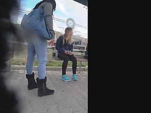 Curvy girl in torn jeans is smoking and waiting for the bus Picture 7