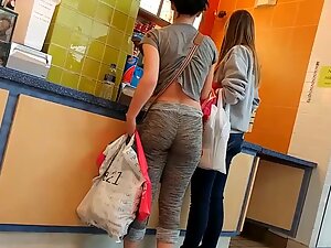 Sexy woman in unusual leggings that flatter her ass