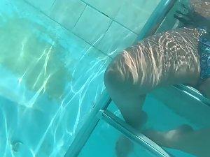 Swimming around a girl to videotape her crotch Picture 3