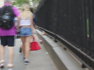 Cheeky girl followed because of shorts Picture 6