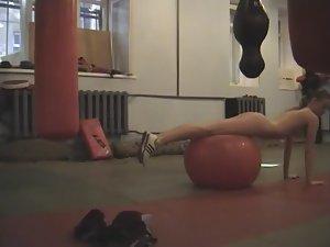 Peeping on a nudist girl's exercising Picture 2