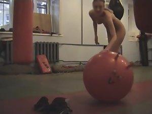 Peeping on a nudist girl's exercising Picture 6
