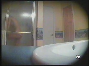Teen girl showering in the bathroom Picture 2