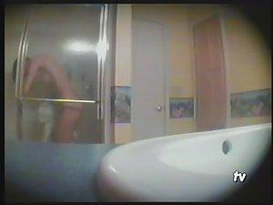 Teen girl showering in the bathroom Picture 4