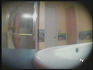 Teen girl showering in the bathroom Picture 5