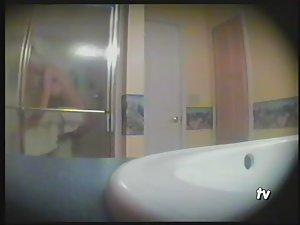 Teen girl showering in the bathroom Picture 6