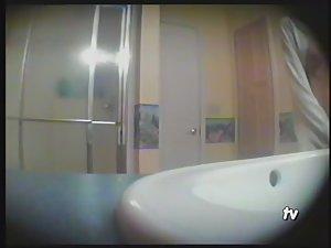 Teen girl showering in the bathroom Picture 7